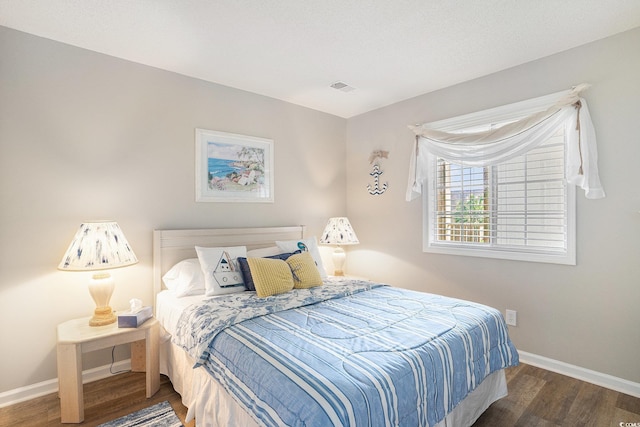 1900 Duffy St Unit L4, North Myrtle Beach, SC 29582 - bedroom with baseboards and wood finished floors