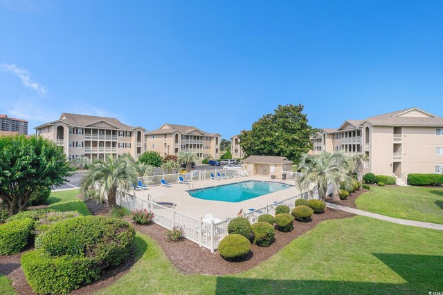1900 Duffy St Unit L4, North Myrtle Beach, SC 29582 - community pool featuring a patio and a residential view