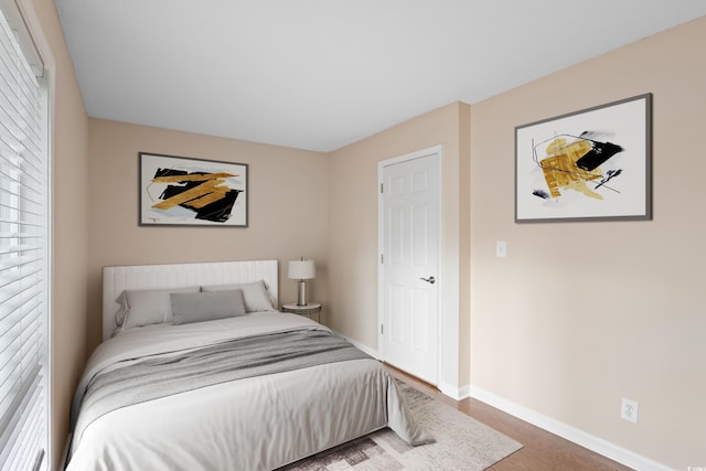 403 75th Ave N Unit C, Myrtle Beach, SC 29572 - bedroom featuring baseboards and wood finished floors