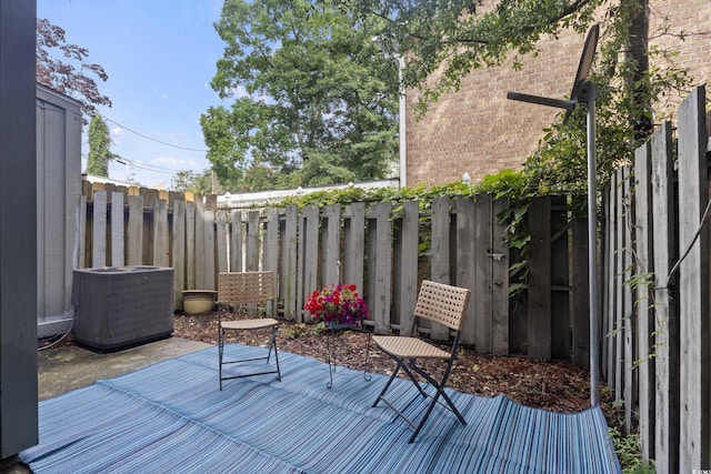 403 75th Ave N Unit C, Myrtle Beach, SC 29572 - wooden terrace featuring central AC