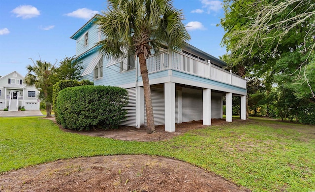141 Cayman Loop, Pawleys Island, SC 29585 - view of side of home with a lawn
