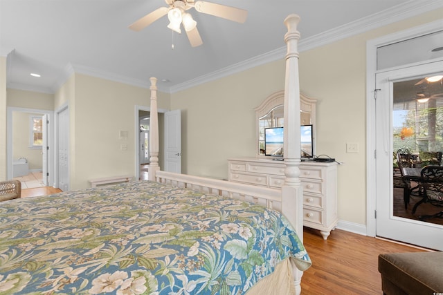 141 Cayman Loop, Pawleys Island, SC 29585 - bedroom with ornamental molding, light wood-style floors, ensuite bath, a ceiling fan, and baseboards