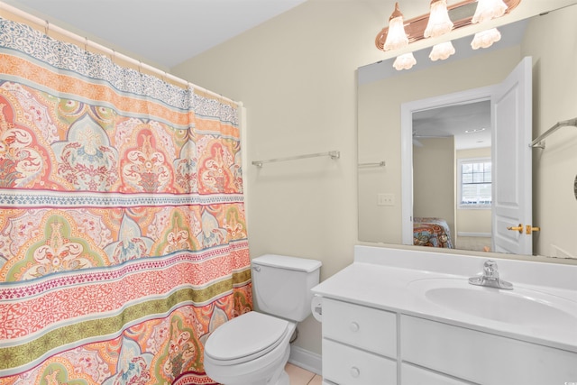 141 Cayman Loop, Pawleys Island, SC 29585 - ensuite bathroom featuring vanity, toilet, a shower with curtain, and baseboards