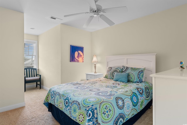 141 Cayman Loop, Pawleys Island, SC 29585 - bedroom featuring light colored carpet, baseboards, and a ceiling fan