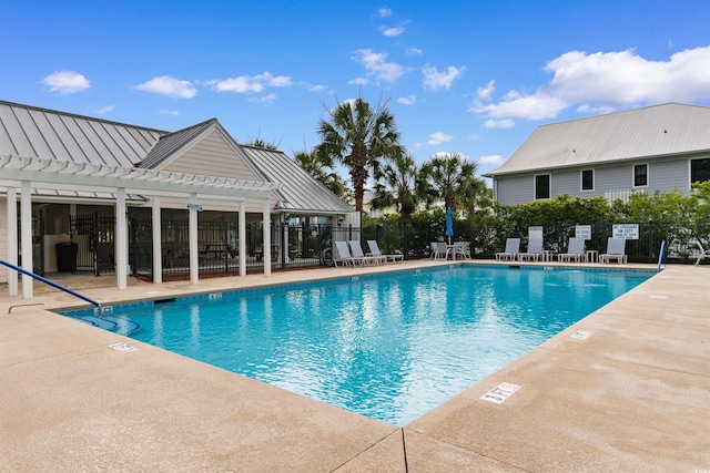 141 Cayman Loop, Pawleys Island, SC 29585 - community pool with a pergola and a patio