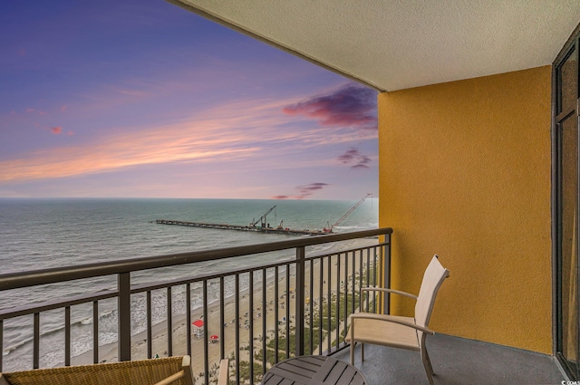 2600 N Ocean Blvd Unit 1406, Myrtle Beach, SC 29577 - balcony at dusk featuring a water view