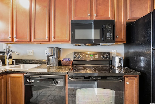 2600 N Ocean Blvd Unit 1406, Myrtle Beach, SC 29577 - kitchen with black appliances, a sink, and brown cabinetry