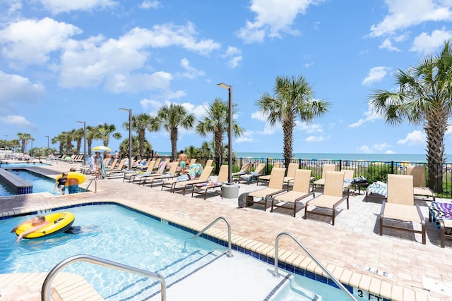 2600 N Ocean Blvd Unit 1406, Myrtle Beach, SC 29577 - community pool with a water view and a patio