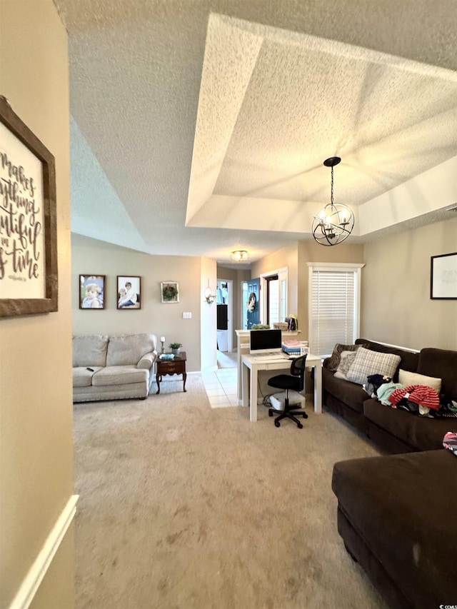 2707 Canvasback Trl, Myrtle Beach, SC 29588 - carpeted living room with a textured ceiling and a tray ceiling