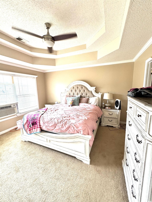 2707 Canvasback Trl, Myrtle Beach, SC 29588 - carpeted bedroom with a tray ceiling, a textured ceiling, ornamental molding, cooling unit, and ceiling fan