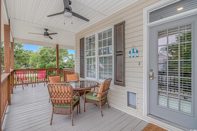 4600 Murrells Inlet Rd, Murrells Inlet, SC 29576 - wooden terrace featuring a ceiling fan and outdoor dining area