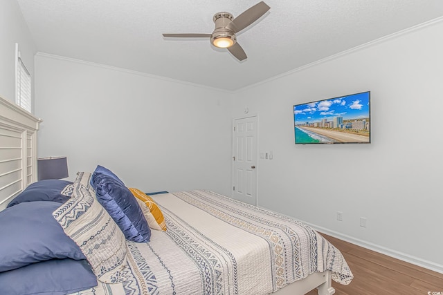 4600 Murrells Inlet Rd, Murrells Inlet, SC 29576 - bedroom featuring wood finished floors, ornamental molding, and ceiling fan