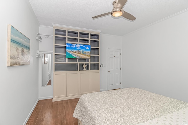 4600 Murrells Inlet Rd, Murrells Inlet, SC 29576 - bedroom with wood finished floors, ornamental molding, a ceiling fan, and a textured ceiling