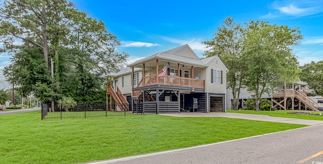 4600 Murrells Inlet Rd, Murrells Inlet, SC 29576 - beach home with stairs, a ceiling fan, a porch, and a carport
