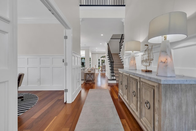 1619 Eastover Ln, North Myrtle Beach, SC 29582 - foyer with dark wood-type flooring, stairway, crown molding, a decorative wall, and recessed lighting