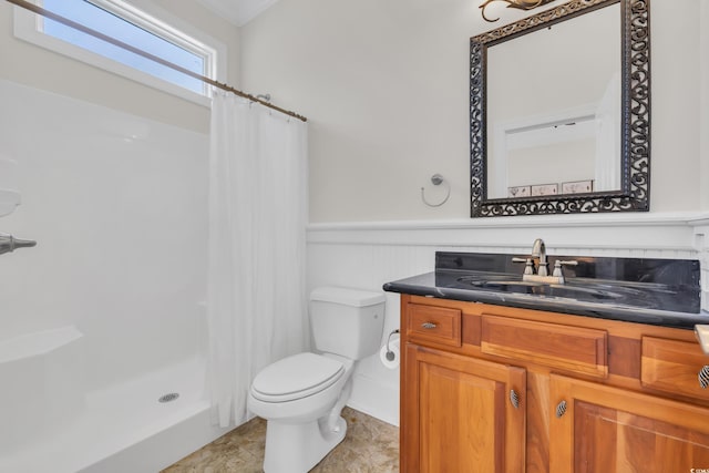 1619 Eastover Ln, North Myrtle Beach, SC 29582 - bathroom with a wainscoted wall, toilet, curtained shower, and vanity