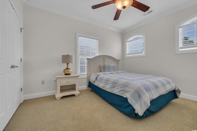 1619 Eastover Ln, North Myrtle Beach, SC 29582 - carpeted bedroom featuring ornamental molding, baseboards, multiple windows, and ceiling fan