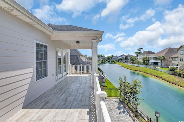 1619 Eastover Ln, North Myrtle Beach, SC 29582 - wooden deck with a water view and a residential view