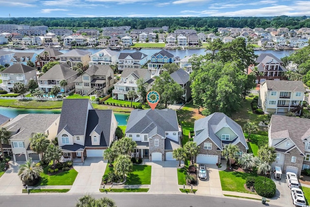 1619 Eastover Ln, North Myrtle Beach, SC 29582 - aerial perspective of suburban area with a nearby body of water