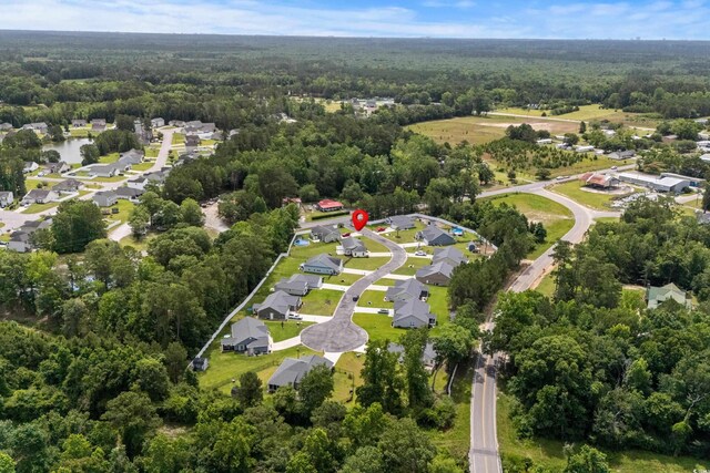 104 Browns Hollow Ct, Loris, SC 29569 - aerial view of property and surrounding area with a forest and nearby suburban area