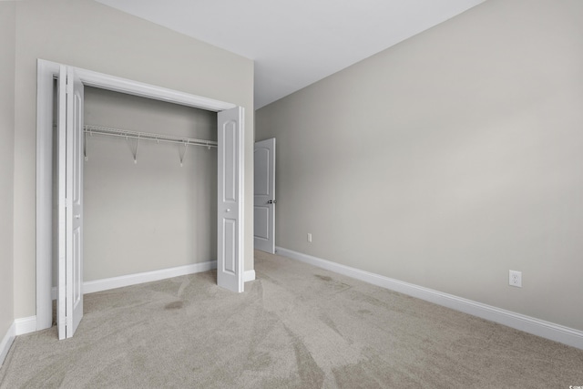 104 Browns Hollow Ct, Loris, SC 29569 - unfurnished bedroom featuring carpet flooring and a closet