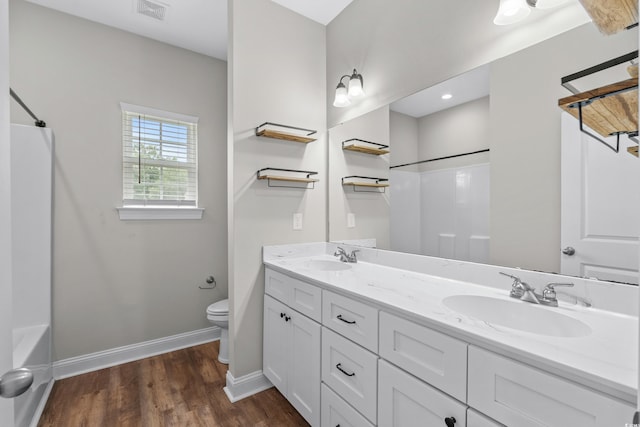 104 Browns Hollow Ct, Loris, SC 29569 - bathroom with double vanity, wood finished floors, and  shower combination