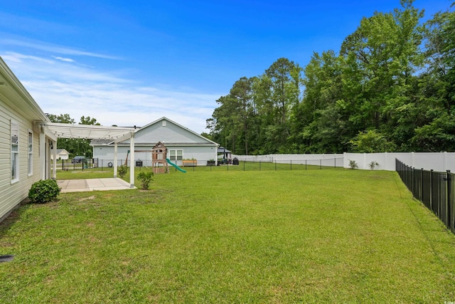 104 Browns Hollow Ct, Loris, SC 29569 - fenced backyard with a playground and a patio