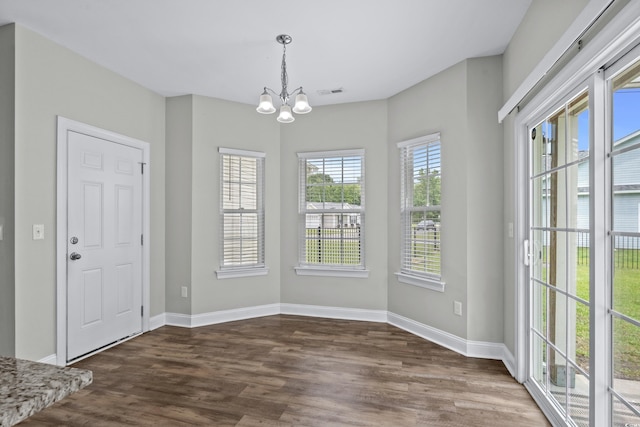 104 Browns Hollow Ct, Loris, SC 29569 - unfurnished dining area featuring a chandelier and wood finished floors