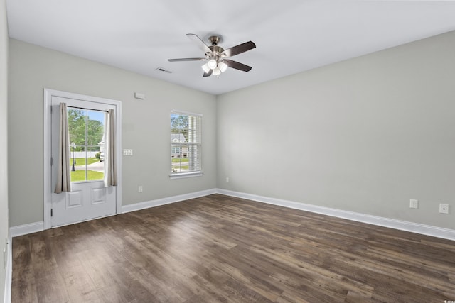 104 Browns Hollow Ct, Loris, SC 29569 - spare room featuring dark wood-style flooring and ceiling fan
