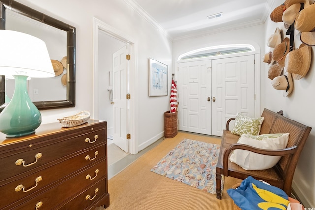 95 Sanderling Ave, Georgetown, SC 29440 - foyer featuring light colored carpet and crown molding