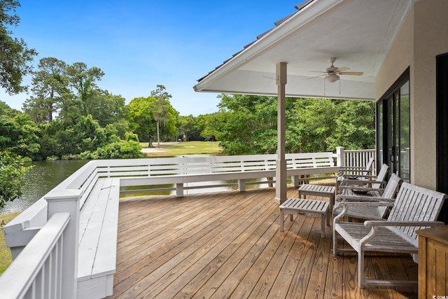 95 Sanderling Ave, Georgetown, SC 29440 - wooden terrace with view of scattered trees, ceiling fan, and a water view