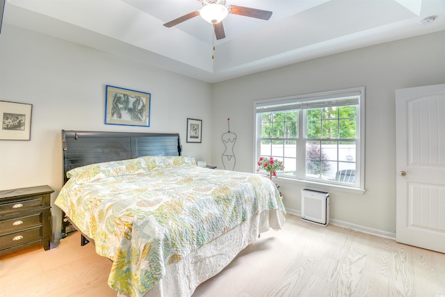 631 Rycola Cir, Surfside Beach, SC 29575 - bedroom featuring a tray ceiling, baseboards, and ceiling fan