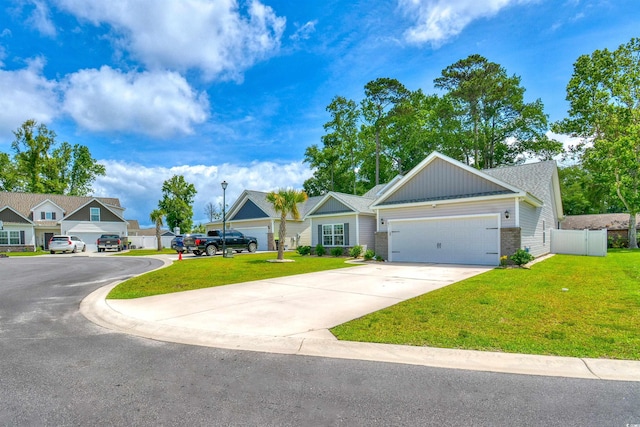 631 Rycola Cir, Surfside Beach, SC 29575 - view of front of home with concrete driveway, a garage, brick siding, and a residential view