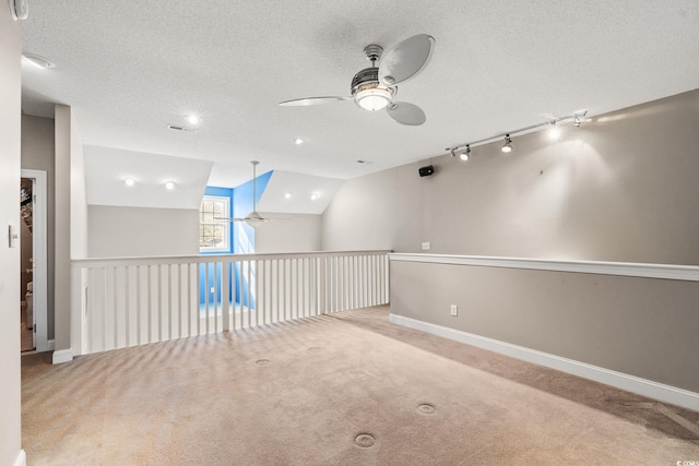 4378 Willoughby Ln Unit 4378, Myrtle Beach, SC 29577 - spare room featuring a ceiling fan, carpet, and a textured ceiling