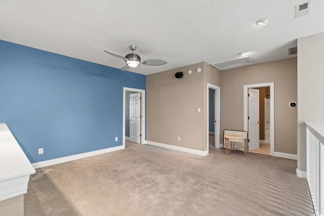 4378 Willoughby Ln Unit 4378, Myrtle Beach, SC 29577 - empty room featuring attic access, a textured ceiling, a ceiling fan, and light colored carpet