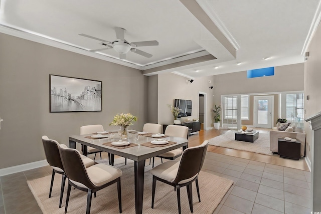 4378 Willoughby Ln Unit 4378, Myrtle Beach, SC 29577 - dining space with light tile patterned floors, a ceiling fan, and crown molding