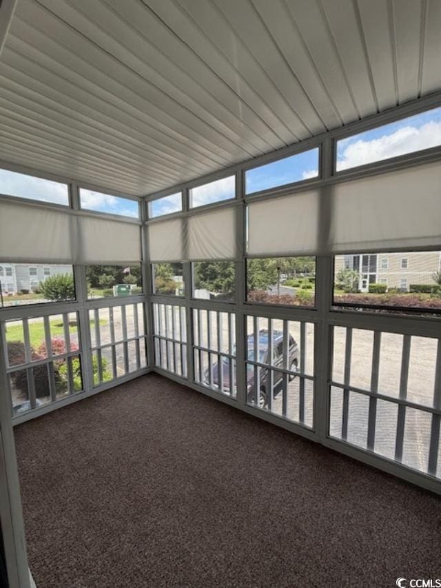 1980 Bent Grass Dr Unit F, Surfside Beach, SC 29575 - unfurnished sunroom with carpet and healthy amount of natural light