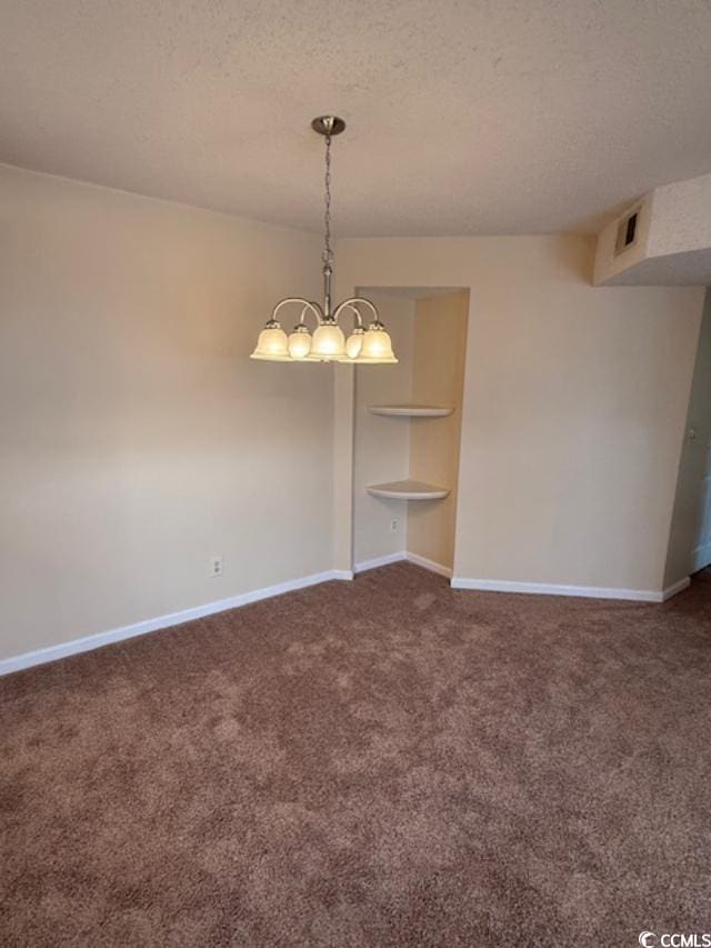 1980 Bent Grass Dr Unit F, Surfside Beach, SC 29575 - carpeted spare room with a chandelier and a textured ceiling