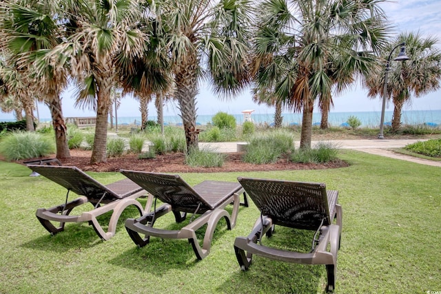 504 N Ocean Blvd Unit 1106, Myrtle Beach, SC 29577 - view of green lawn featuring a water view