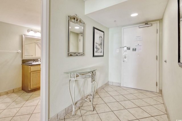 504 N Ocean Blvd Unit 1106, Myrtle Beach, SC 29577 - foyer featuring light tile patterned flooring and baseboards