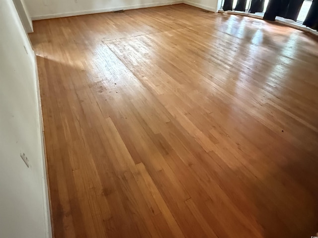 4909 Yaupon Cir, Myrtle Beach, SC 29575 - detailed view of wood finished floors and baseboards