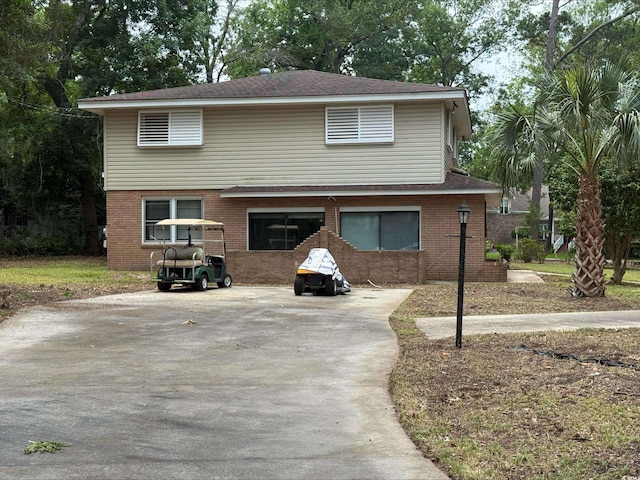 4909 Yaupon Cir, Myrtle Beach, SC 29575 - view of front of property with brick siding and concrete driveway