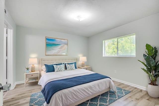 1200 5th Ave N Unit 1207, Surfside Beach, SC 29575 - bedroom with light wood-type flooring and baseboards