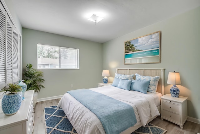 1200 5th Ave N Unit 1207, Surfside Beach, SC 29575 - bedroom with light wood-type flooring and baseboards