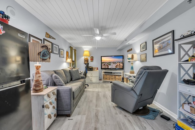 1625 S Ocean Blvd Unit 211, North Myrtle Beach, SC 29582 - living area with light wood finished floors, ceiling fan, and wood ceiling