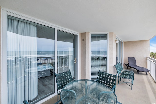1625 S Ocean Blvd Unit 211, North Myrtle Beach, SC 29582 - balcony with outdoor dining area