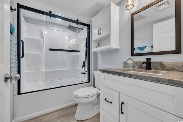 1625 S Ocean Blvd Unit 211, North Myrtle Beach, SC 29582 - bathroom featuring vanity, wood finished floors, and enclosed tub / shower combo