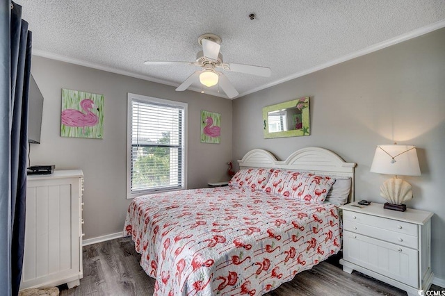211 N Hillside Dr Unit 204, North Myrtle Beach, SC 29582 - bedroom featuring dark wood finished floors, crown molding, a textured ceiling, and a ceiling fan