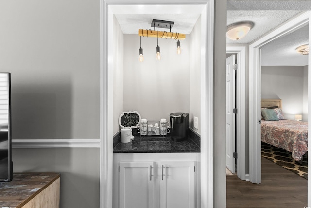 1356 Glenns Bay Rd Unit A202, Surfside Beach, SC 29575 - bar featuring dark wood-type flooring