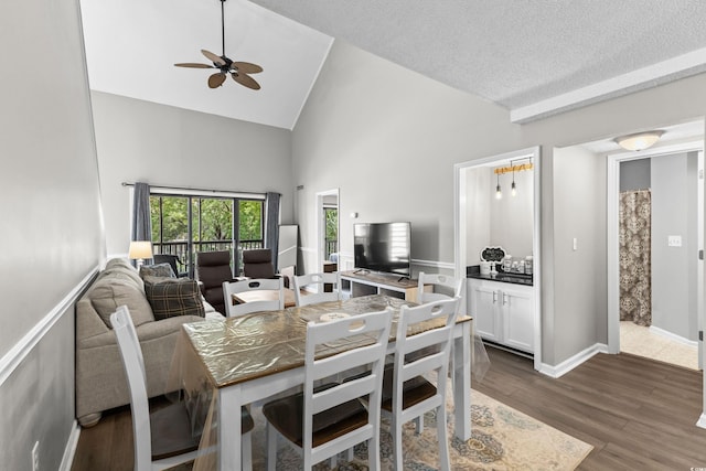 1356 Glenns Bay Rd Unit A202, Surfside Beach, SC 29575 - dining space with high vaulted ceiling, ceiling fan, and dark wood-style floors